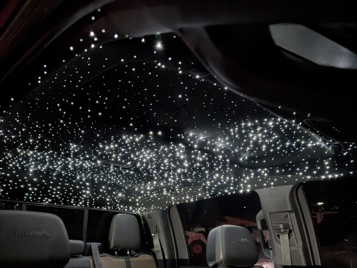Starlight headliner install glowing inside a High Country cab